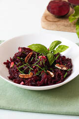 Healthy vegan beetroot salad with walnuts. Selective focus