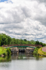 Fototapeta premium A scenic view of the bridge over the canal lock at Ecluse 10 de Bagneaux along the Canal du Loing in France