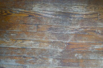 Wood floor worn and damaged 