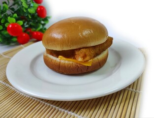 The Filet-O-Fish is a fish sandwich on white plate,isolated on white background.