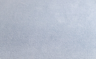 Soft and fluffy light blue fabric, ideal for cozy projects or home decor.