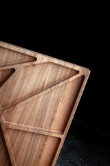 The sideboard is made of wood for serving snacks, fruits, nuts, cheeses, meats and original serving of main dishes. Luxury products from hard and exotic wood species. Accessories for a modern kitchen.