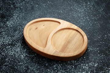 The sideboard is made of wood for serving snacks, fruits, nuts, cheeses, meats and original serving of main dishes. Luxury products from hard and exotic wood species. Accessories for a modern kitchen.