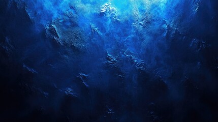 Fototapeta premium Textured dark blue background with subtle lighting effects and depth
