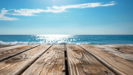 Fototapeta premium Wooden Plank Surface with Blurred Ocean and Sky Background