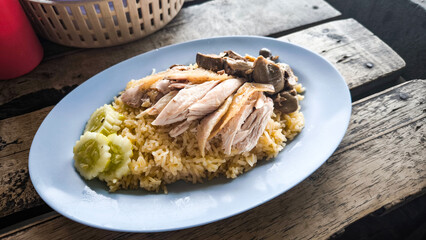 Chicken rice on a plate in a restaurant