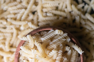 raw italian pasta in a bowl  semi circle photo