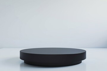 A sleek, black pedestal stands isolated on a pristine white backdrop, ready to showcase your product in style.
