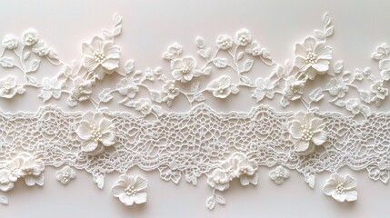 Obraz premium Delicate White Floral Lace Trim: A close-up of exquisite white lace with intricate floral designs, perfect for adding a touch of elegance and sophistication to any project. 
