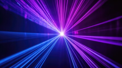 Obraz premium Blue and violet beams of bright laser light shining on black background