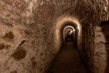 A narrow  stone tunnel passing under the fortress walls in the Vysehrad district of the Prague in Czech Republic