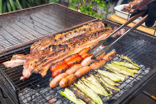Chilean celebration of the national holidays where you eat chilean asado, roasts, meats and chickens that are eaten on fire as part of the traditions of Chile