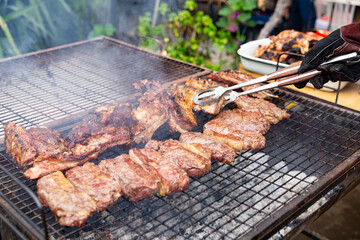 Chilean celebration of the national holidays where you eat chilean asado, roasts, meats and chickens that are eaten on fire as part of the traditions of Chile