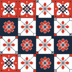 Seamless pattern of red white and blue geometric flower tiles