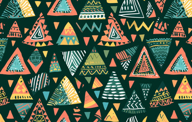 Seamless pattern with colorful hand drawn triangles abstract geometric shapes and tribal elements on a dark green background