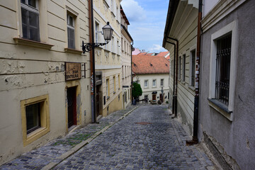 Bratislava, Slovakia - May 26 2024: Cobbled Old Town Beblaveho Street on the Castle Mountain.