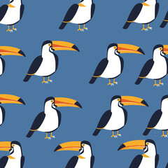 Obraz premium Seamless pattern of cartoon toucans with large beaks on a blue background. This colorful design is perfect for fabric, wallpaper, or wrapping paper.