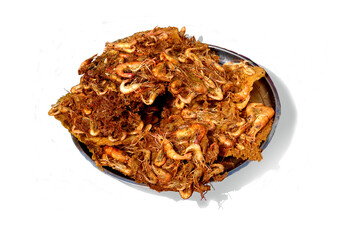 Fried organic shrimp in a tray on a white background.