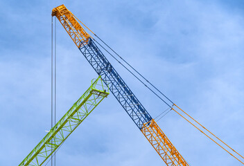 construction crane at blue sky as background