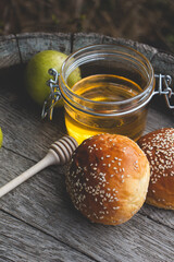 Fresh bread with honey and apples