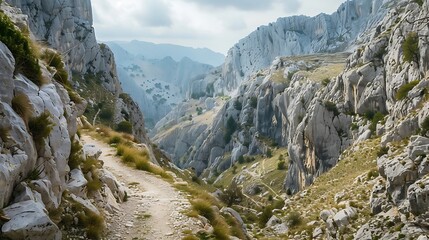 A narrow mountain route that winds through rocky terrain