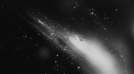 Obraz premium White Dust Particles Suspended in a Black Background