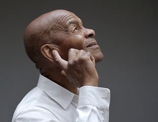 deaf man suffering from deafness and hearing loss on grey background with people stock image stock...