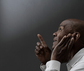 deaf man suffering from deafness and hearing loss on grey background with people stock image stock...