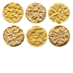 Corn chips with banana flavored frosting on a white background
