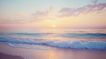 Fototapeta premium Serene beach at sunrise with gentle waves and a pastel sky