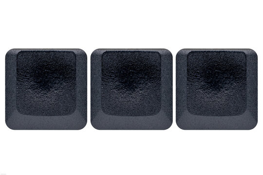 3 Black used keys buttons from a keyboard with no text