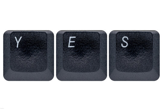 Black keys buttons from a keyboard showing the word YES in a very used way, indicating that they say often Yes