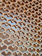 Background wooden pattern of a window in ancient city.