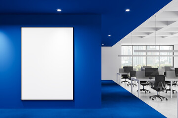Blank poster mockup on blue wall in modern office space. 3D Rendering