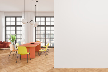 Stylish living room interior with dining and relaxing area, window. Mock up wall