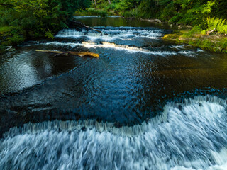 Cascades on the river in summer.