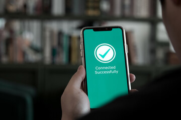 Businessman using smartphone for connect successfully to network signal. Concept of digital data exchange technology, remote control system connection.
