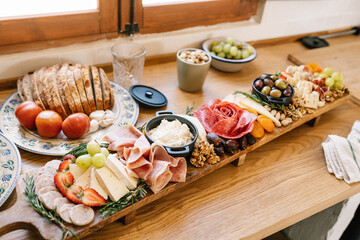 Gourmet charcuterie board with assorted snacks