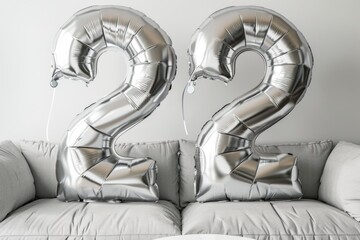 Silver Number Balloons for 22nd Birthday Celebration on Couch