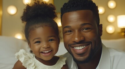 A father and daughter joyfully smile together in a warmly lit room, radiating love and happiness