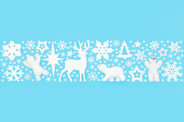 Christmas Eve North Pole  fantasy design reindeer, polar bear, snowflake star pattern banner on blue. Frosted white decoration for Yule, Noel, Xmas season.