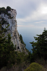 Amazing view down to the sea from the mountain in Othonoi island, north-west of Corfu, Greece, at dusk