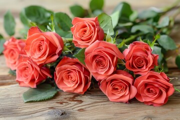 Beautiful Bunch of Fresh Coral Roses Arranged on Rustic Wooden Table in Natural Light