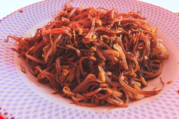 Top view of soybean sprouts on a plate ready to be eaten