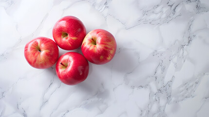 Vibrant Red Apples on Sleek White Marble Surface for Healthy Lifestyle Advertisements