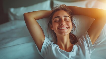 Fototapeta premium Smiling Woman Waking Up in Morning and Stretching in Bed