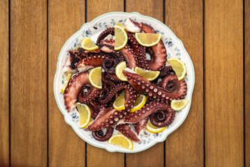 dish with octopus on the restaurant table