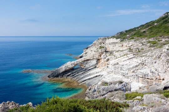 Amazing rocky formations and gorgeous sea waters of the south coastline in Othonoi island, Greece