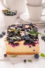 Homemade and tasty blueberry cheesecake as spring dessert.