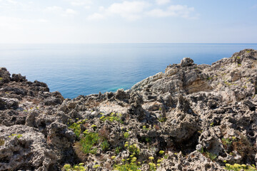 Amazing rocky formations and gorgeous sea waters of the south coastline in Othonoi island, Greece
